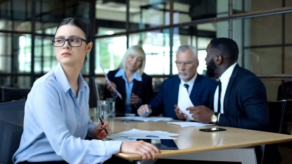 7-signs-image-2 Woman at meeting