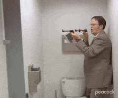 dwight-schrut-blowdart Dwight Schrute practicing with a blowgun
