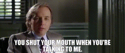 shut-your-mouth Woman telling coworkers to shut their mouths when talking to her